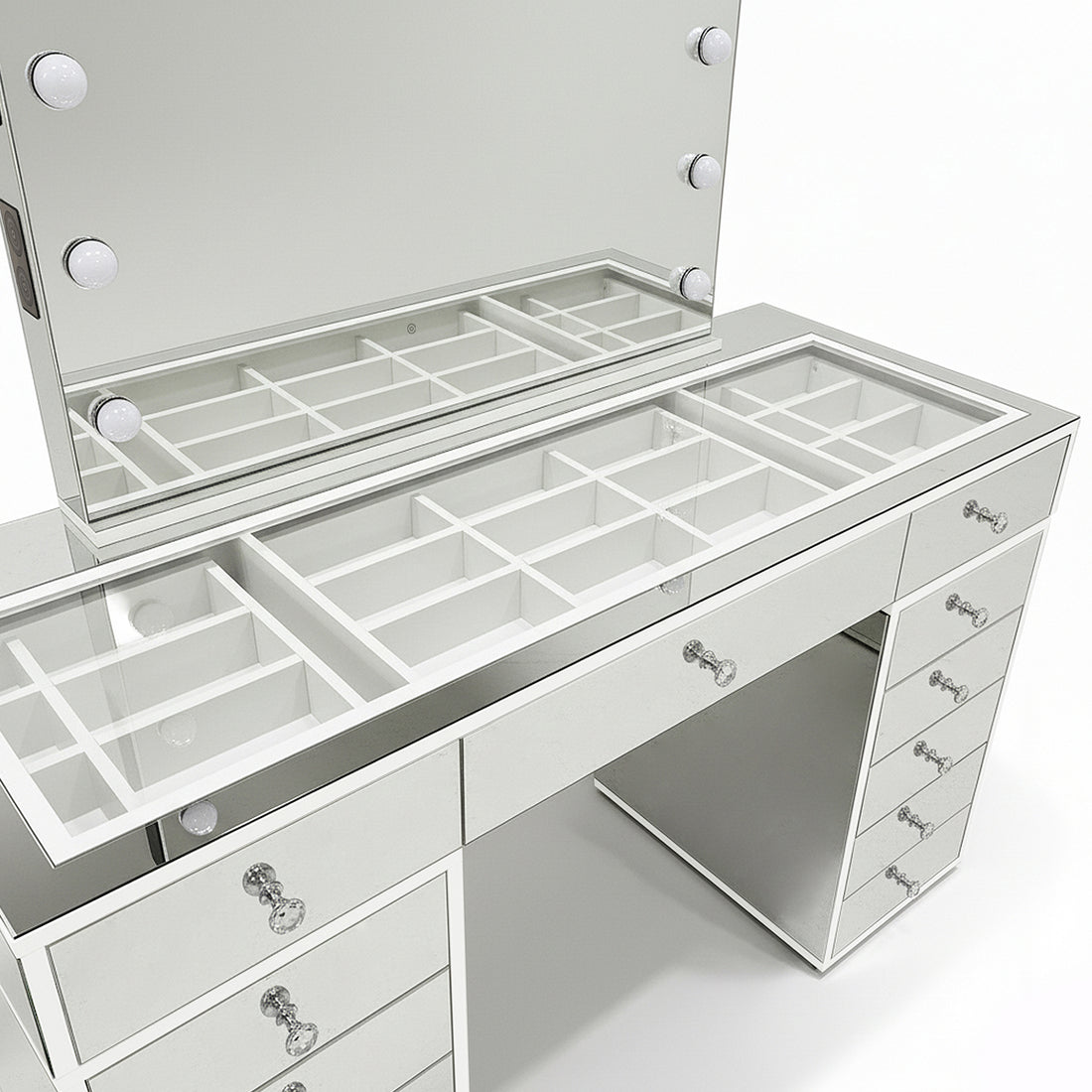 Monroe 13 Drawer Mirror Finish Hollywood LED Dressing Table with light-bulb-framed mirror, glass-topped organizer, crystal-style drawer pulls, and integrated power features, creating a luxe beauty setup.