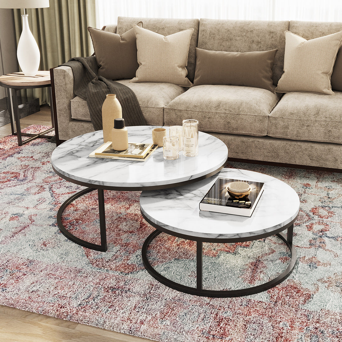 Nevada Round Nesting Coffee Table Set White Marble displayed with a decorative bowl on top, offering a stylish, space-saving design ideal for modern living rooms with multiple surface heights.