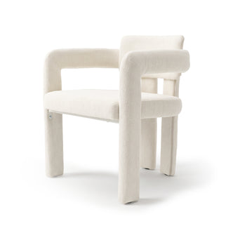 Contemporary off-white upholstered chair on a seamless white background