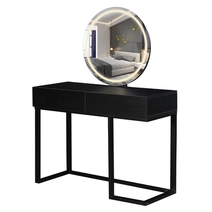 Ophira Dressing Table with Touch Screen Mirror Light – Black features a matte black finish, two top drawers, a minimal metal base, and a large round LED-lit mirror reflecting a contemporary bedroom.