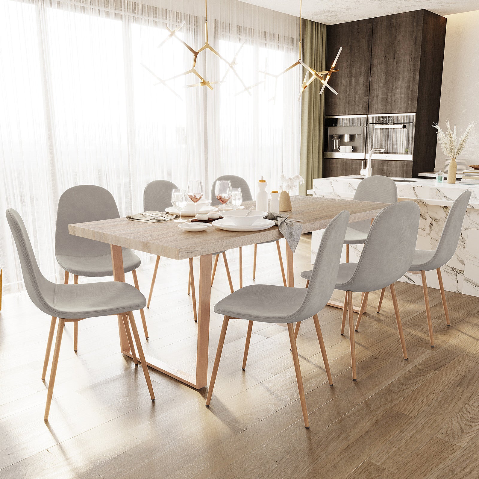 Oregon & Florida 8 Seater Dining Table & Chair Set in Grey features a light-wood table, grey upholstered chairs, and gold-tone pendant lights, set in a bright dining area with sheer curtains.