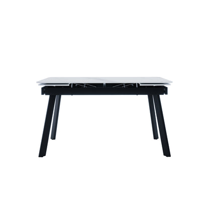 Rheed 197cm Extendable Ceramic Porcelain Dining Table White features a light-colored tabletop with two panels, exposing metal mechanisms for extension, supported by angled black legs for a modern look.