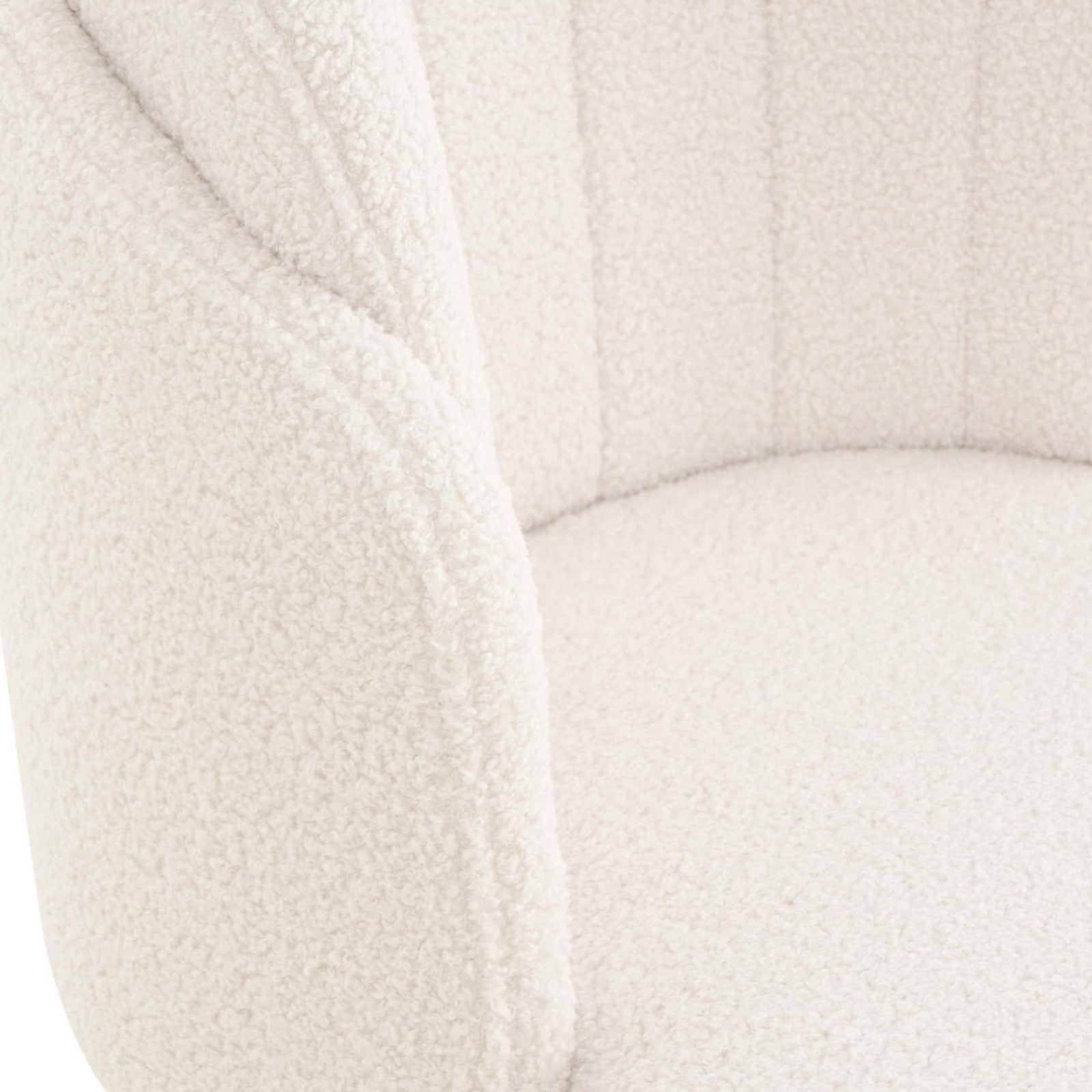 Scarlett Boucle Dining Chair Set of 2 in Cream White, showcasing the chair's soft, nubby boucle fabric on its curved back, armrest, and seat, highlighting its elegant and textured surface.