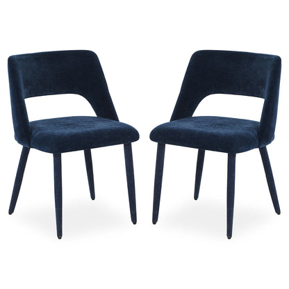 Two dark blue velvet chairs side by side on a white background