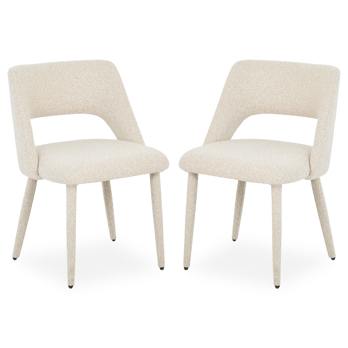 Pair of modern upholstered chairs on white background