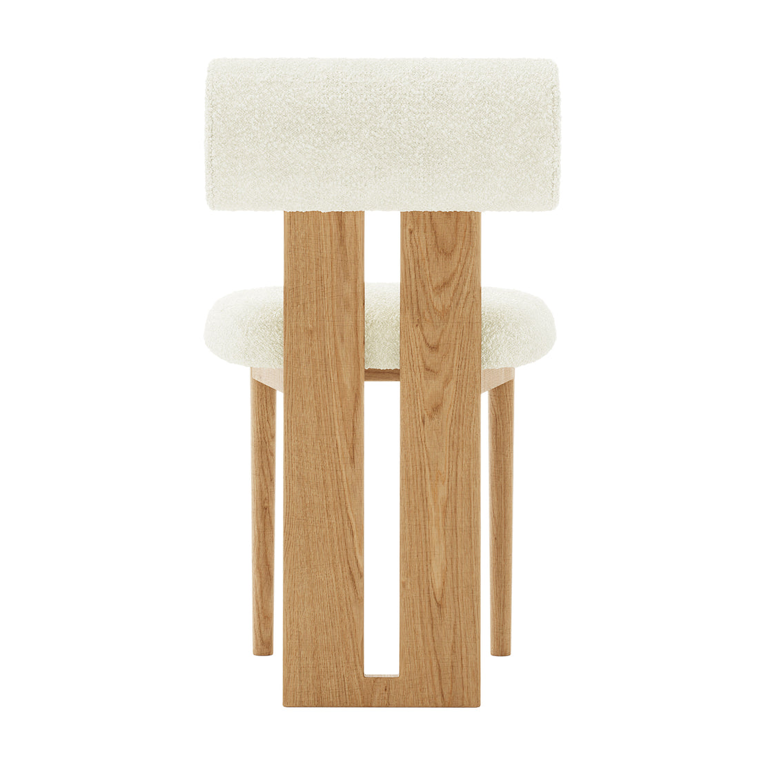 Wylie Boucle Oak Dining Chair Cream White Set of Two showcasing plush boucle upholstery, thick cushioning, and elegant American oak-paneled legs, emphasizing comfort and sophisticated design in a close-up view.