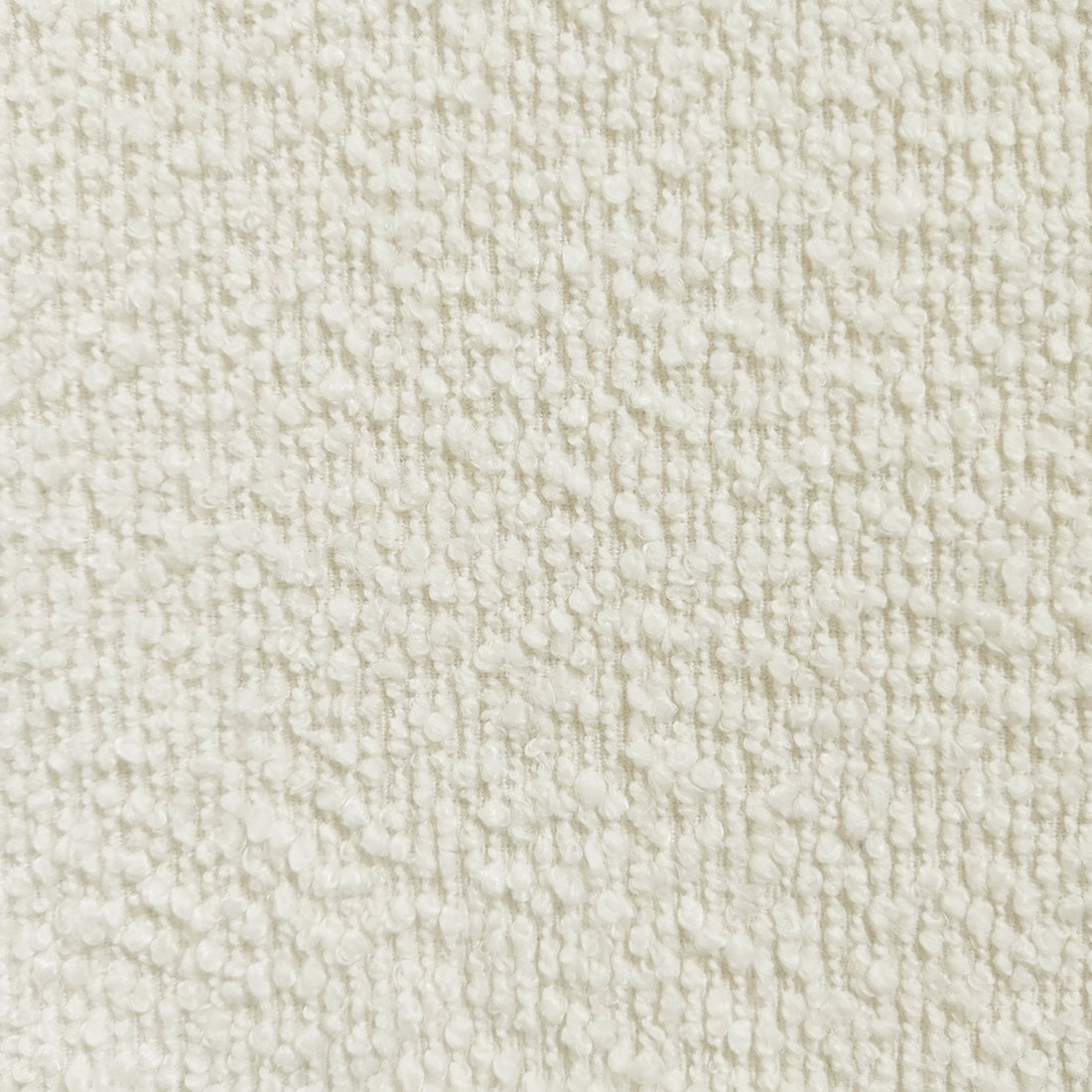 Close-up of Wylie Boucle Oak Dining Chair Set, highlighting plush boucle fabric upholstery with high-density foam padding on seat and backrest, supported by solid American oak frame and oak-paneled legs.