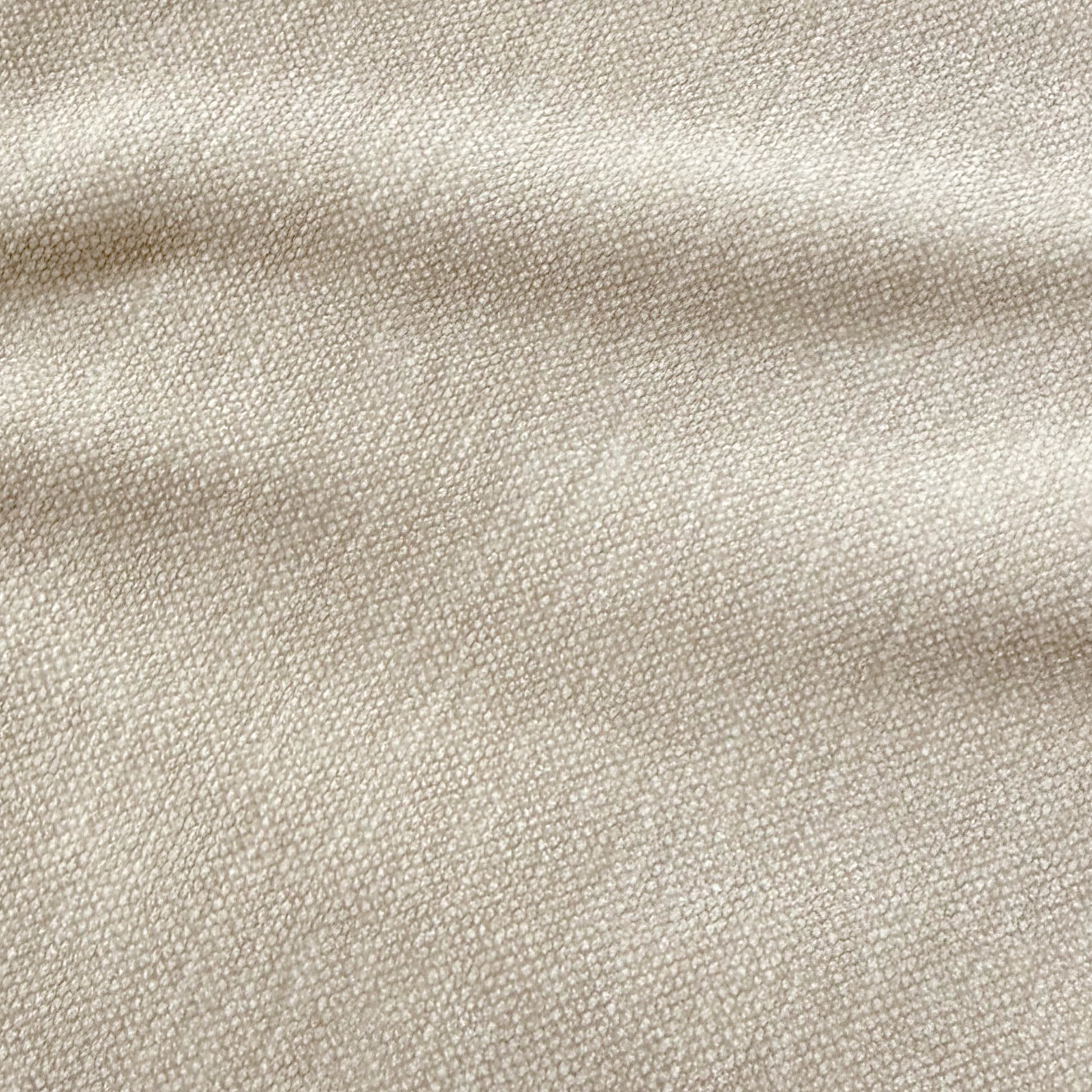 Close-up of the Arlo Chenille 360° Swivel Accent Chair in Oatmeal, showcasing its cream-beige, pebble-grain textured upholstery, embodying tactile luxury and contemporary style.