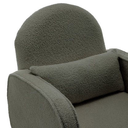 Close-up of the Aura Boucle Rocking Chair with Ottoman in Green, showcasing its modern design with boucle-style fabric, rounded backrest, arm, seat cushion, and matching lumbar pillow.