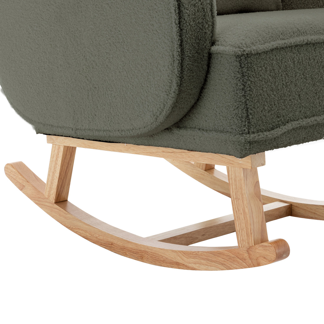 Close-up of the Aura Bouclé Rocking Chair with Ottoman in Green, showing light-wood curved rockers, supporting legs, and a chunky, textured bouclé-style upholstered seat.