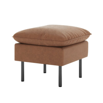 Cassian PU Leather Ottoman in Chocolate Brown features a plush cushion atop a firm base, elevated by slender black metal legs, embodying a sleek, versatile design for any room.