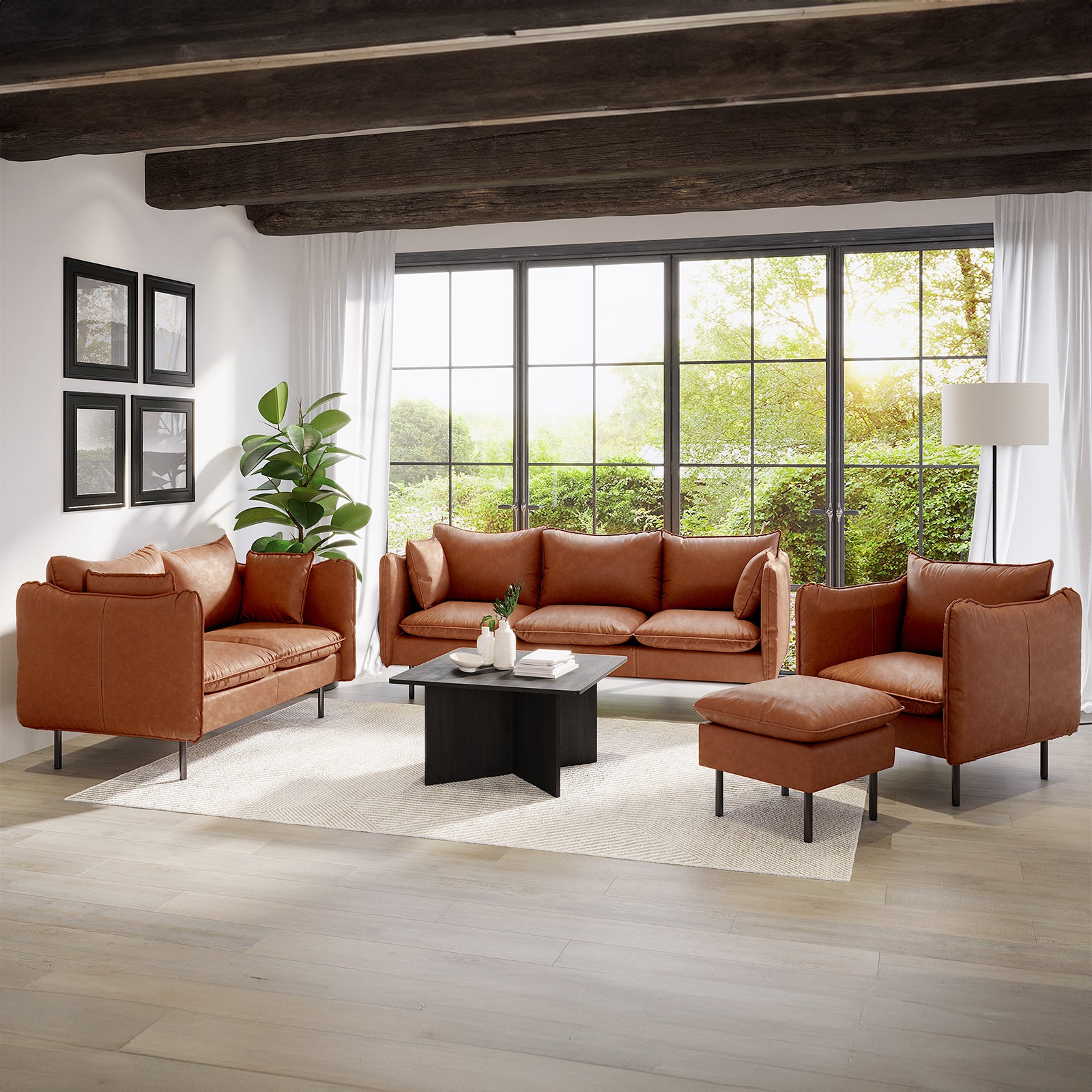 Cassian 7 Seater PU Leather Sofa Set in Mocha features a 3-seater, 2-seater, armchair, and ottoman, all in cognac-brown leather, complementing a cozy, contemporary living room with black wood coffee table.