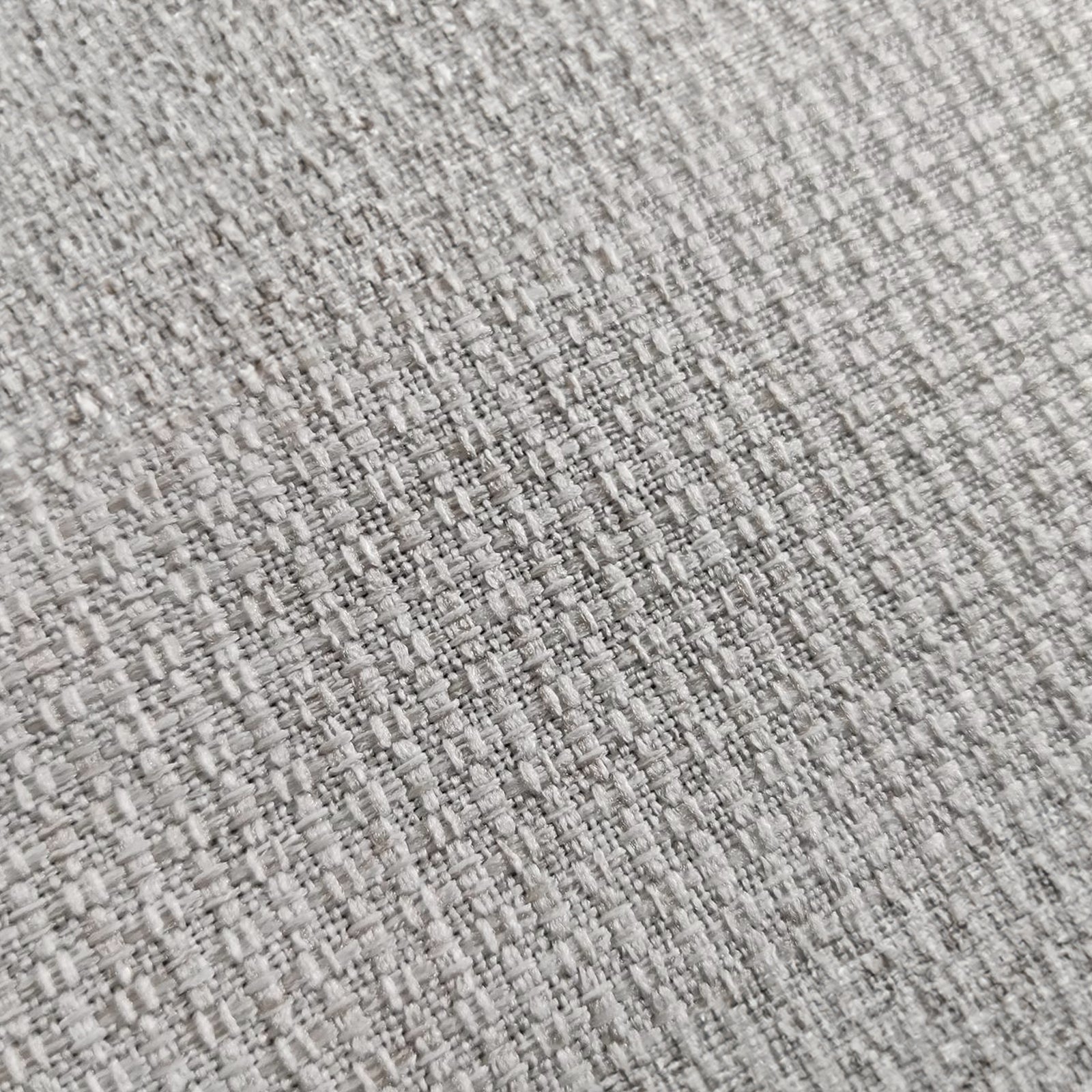 Close-up of the Celeste 3 Seater Hardwood Fabric Sofa, showcasing its textured fabric surface and sturdy frame, highlighting its blend of style and durability.