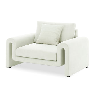 Celyn Curved Velvet Single Sofa Accent Chair in Cream, featuring a sculptural design with continuous armrests, plush velvet fabric, and cushioned seating for luxurious comfort and modern elegance.