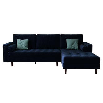 Claude 3 Seater Velvet Sofa with Chaise features plush cushions, a spacious chaise, and a luxurious velvet texture, highlighted in a close-up view showcasing its elegant design and comfort.