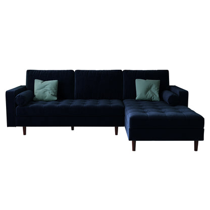 Claude 3 Seater Velvet Sofa with Chaise features plush cushions, a spacious chaise, and a luxurious velvet texture, highlighted in a close-up view showcasing its elegant design and comfort.