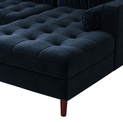Close-up of the Claude 3 Seater Velvet Sofa with Chaise, highlighting its plush cushions, velvet texture, and sturdy wooden legs, showcasing its luxurious and comfortable design for modern living spaces.