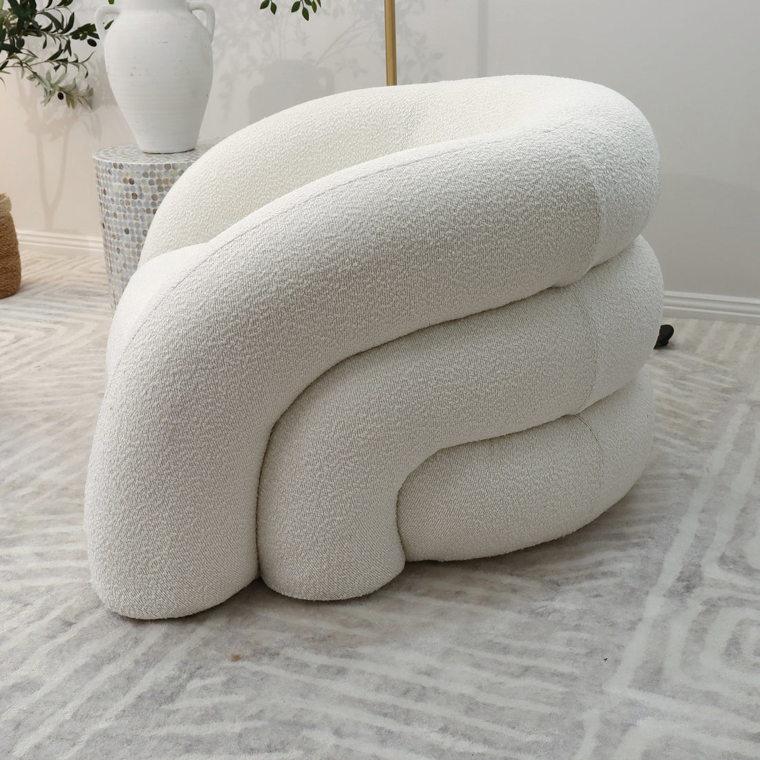 Lifestyle image of Clioz Bouclé 4 Seater Curved Lounge Package Eggshell White