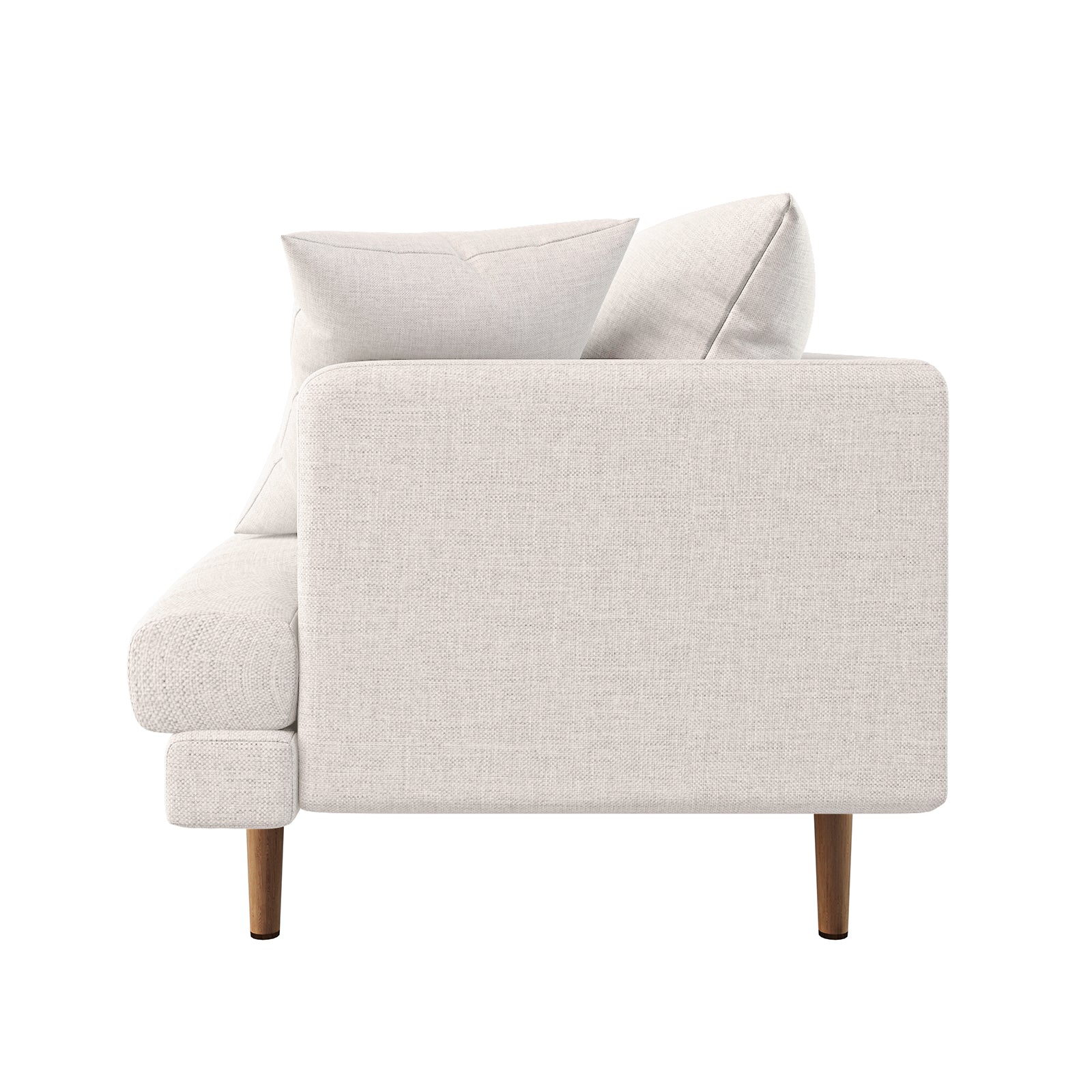 Side-view of Colton Living Room Package in Cream White, showcasing a modern upholstered sofa with boxy armrests, loose back cushions, and slender wooden legs against a plain white background.