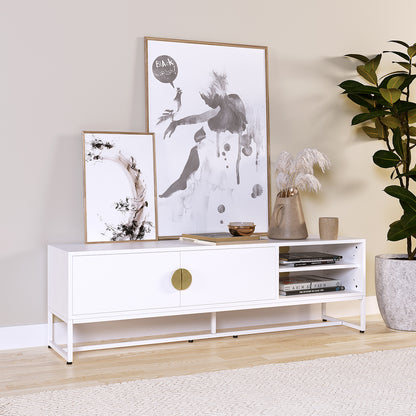 Colton Living Room Package in Cream White features a sleek white media console with brass handles, framed art, books, ceramics, and a lush plant, offering a modern, minimalist aesthetic.