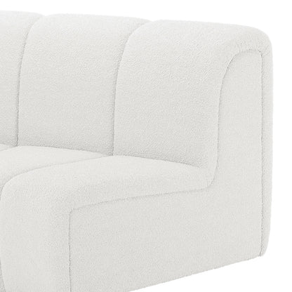 Corina 4 Seater Modular Boucle Sofa in Cream White, showcasing a close-up of its textured fabric, rounded edges, and channel-stitched padding on the backrest and seat for a modern, cozy appeal.