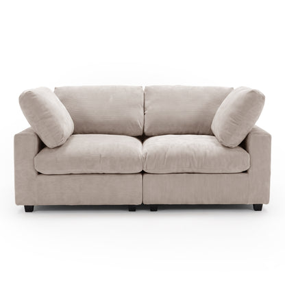 Beige two-seater sofa on a white background