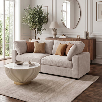 Beige sectional sofa styled in a modern living room