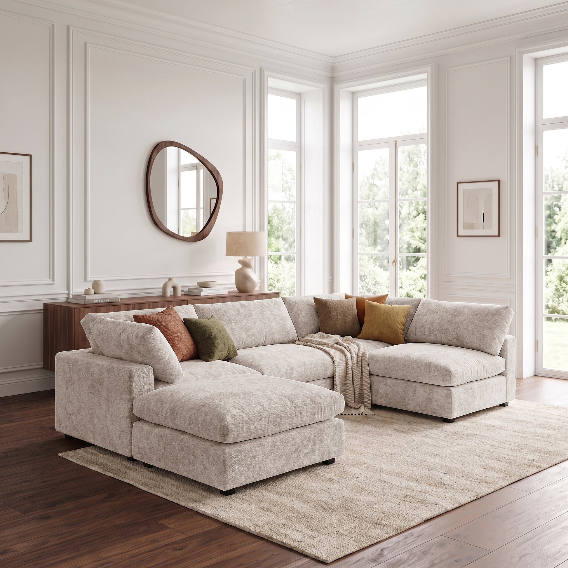 Light beige sectional sofa styled in a bright modern living room