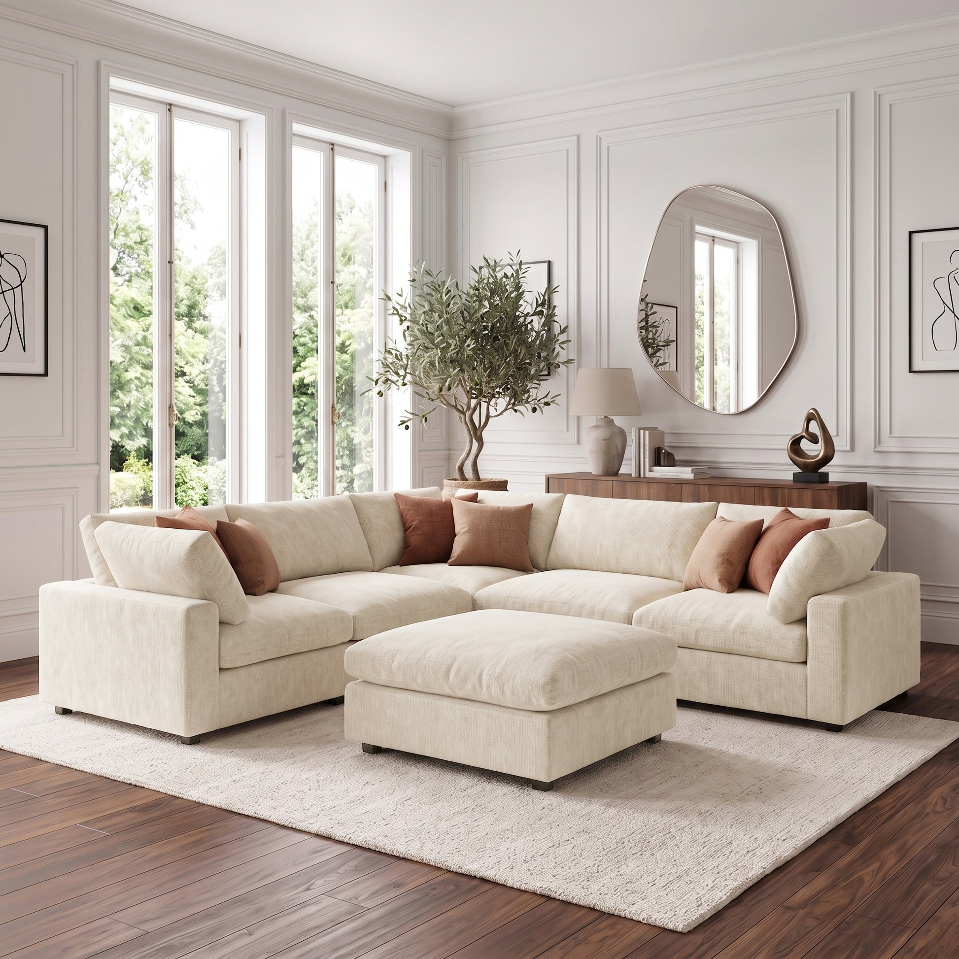 Beige sectional sofa and ottoman in a styled living room