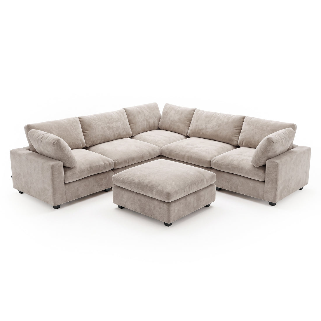 A modular corner sofa in a in Soft Greige, plush fabric, featuring deep seats, comfortable back cushions, and a matching square ottoman positioned in front