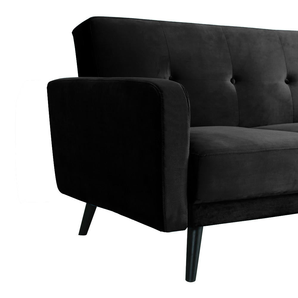 Esben 2-Seater Velvet Sofa Bed in Black, featuring a modern design with a tufted backrest and angled, tapered legs. The sleek black upholstery highlights its stylish and practical aesthetic.