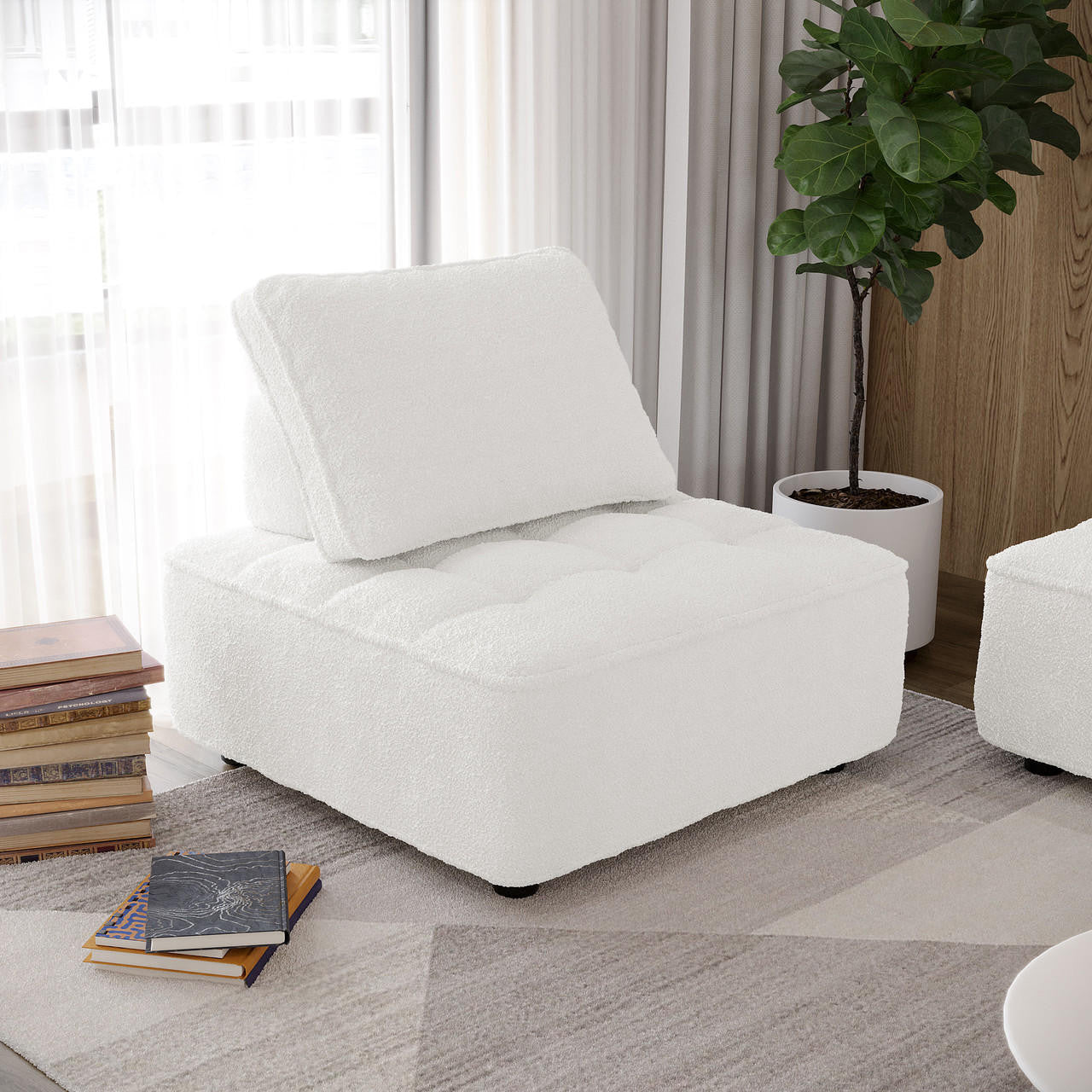 Kazumi Boucle Modular Single Sofa Chair in Cream White, centered in a modern living area, features boucle fabric and sleek design. Positioned beside books and a fiddle-leaf fig, enhancing minimalist decor.