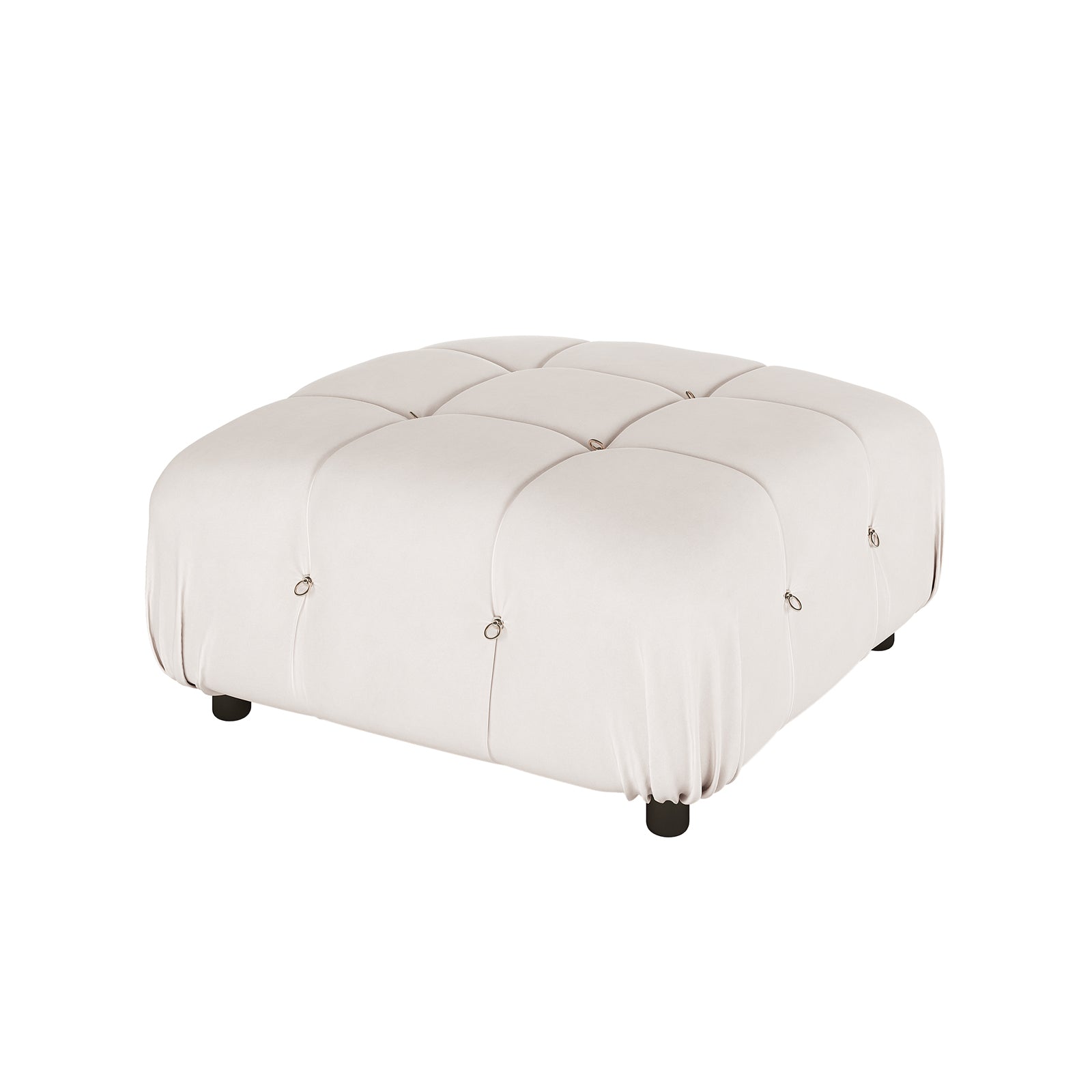 Keila 3 Seater Modular Tufted Sofa with Ottoman in Cream features a low, square ottoman with light-cream fabric, tufted sections with metal rings, and short black feet, showcasing modern elegance.