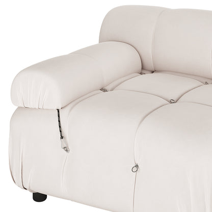Close-up of Keila 2 Seater Sofa & Side Table Package in Cream Velvet, featuring tufted cushions, cloud-style padding, cushioned armrest, metal rings, cord-toggles, and a modular, low-profile design.
