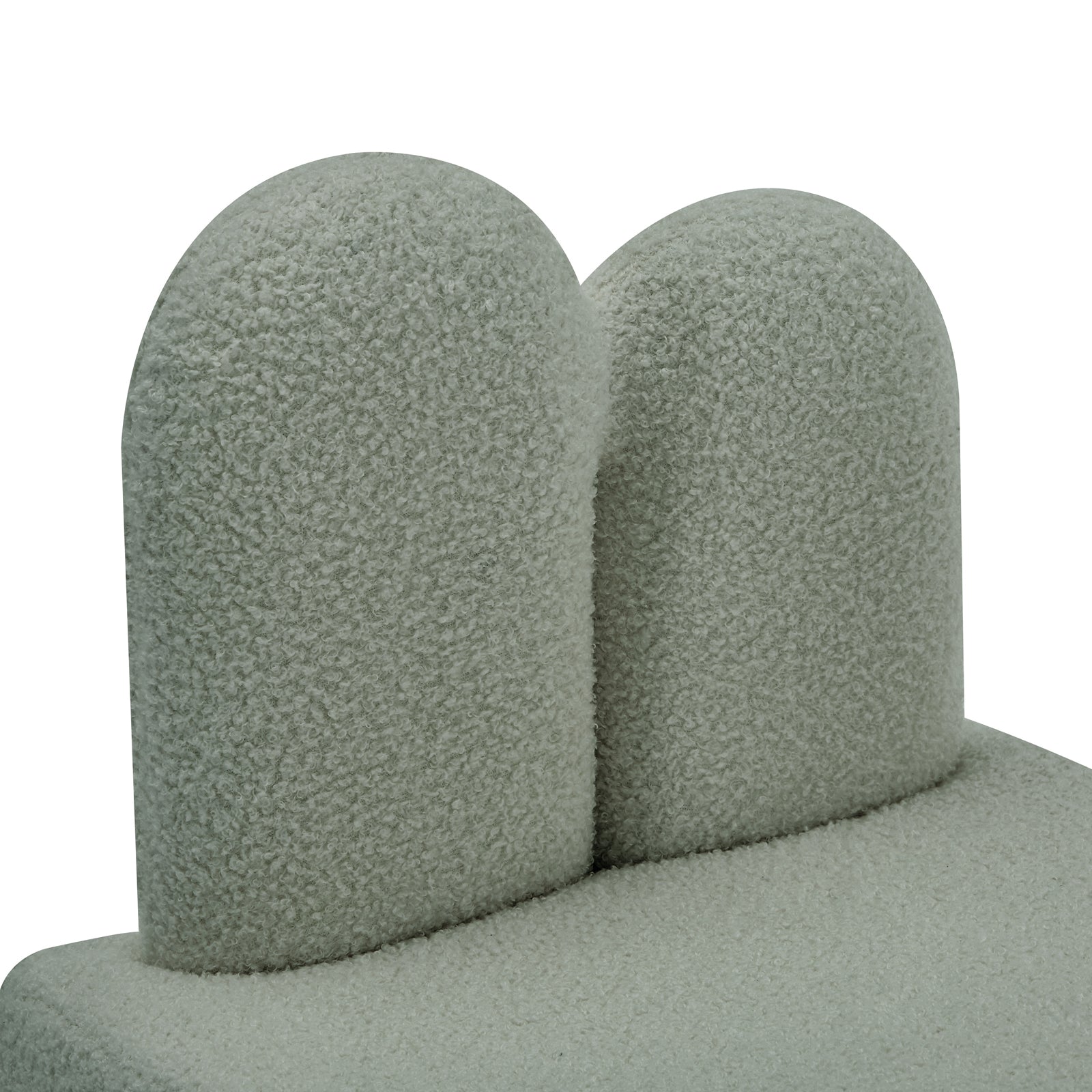 Close-up of the Lenore Boucle Plush Bunny Cushioned Kids Chair, showcasing its soft boucle fabric and whimsical bunny-shaped backrest, designed for comfort and imaginative play in children's spaces.