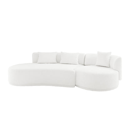Lyana 4 Seater Boucle Sofa with Left Chaise in Cream White features a modern curved design with a C-shaped lounge and rounded ottoman, upholstered in boucle-style fabric with matching back cushions.