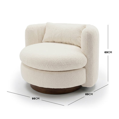 Marvik 360° Swivel Accent Chair in Cream White features a rounded design with creamy-white bouclé upholstery and a thick seat cushion on a low wooden base, showcasing elegance and functionality.