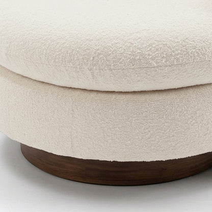Close-up of the Marvik 360° Swivel Accent Chair in Cream White, showcasing its textured boucle upholstery on a round cushion, atop a dark wood base, emphasizing its modern, elegant design.