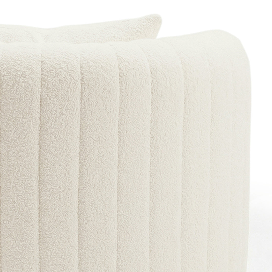 Close-up of the Marvik 360° Swivel Accent Chair in Cream White, showcasing its cream bouclé upholstery with vertical channel stitching, highlighting its luxurious texture and modern design.