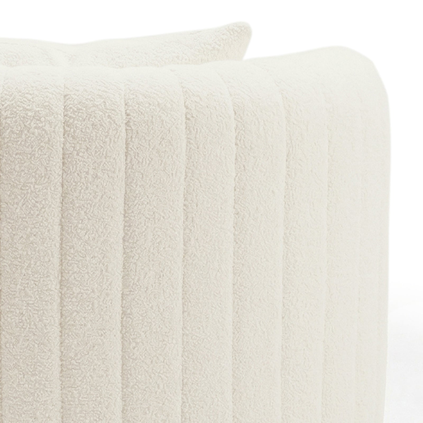 Close-up of the Marvik 360° Swivel Accent Chair in Cream White, showcasing its cream bouclé upholstery with vertical channel stitching, highlighting its luxurious texture and modern design.
