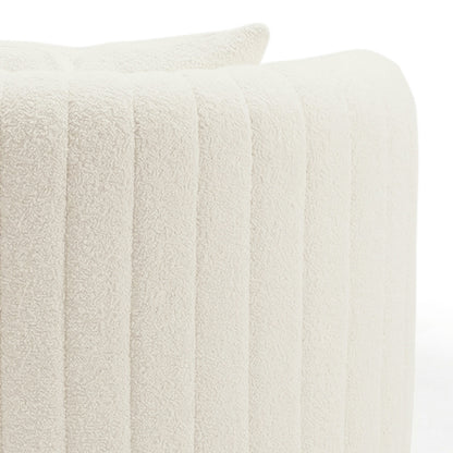 Close-up of the Marvik 360° Swivel Accent Chair in Cream White, showcasing its cream bouclé upholstery with vertical channel stitching, highlighting its luxurious texture and modern design.