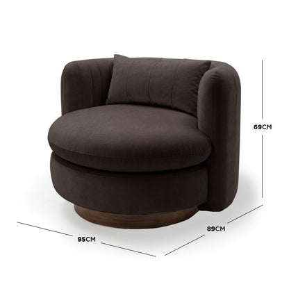 Marvik 360° Swivel Accent Chair in Deep Mocha Brown features a round design with a low, curved back, padded arm wings, and a circular wooden base, offering a stylish, versatile seating solution.