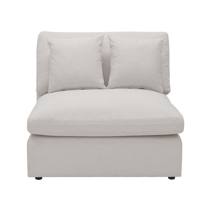 Millie 4-Seater Fabric Modular Sofa - Warm Light Grey, featuring plush cushions on a sleek, adaptable design, perfect for lounging or hosting, showcased with a white throw pillow on a chair.