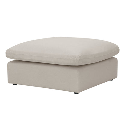 Millie 6-Seater Fabric Corner Chaise Sofa Light Beige with plush cushions, ottoman, and modular design on display, showcasing its spacious and flexible seating arrangement.