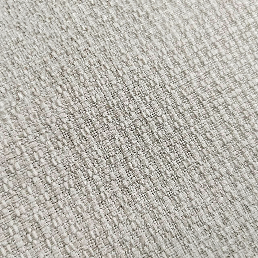 Millie 6-Seater Fabric Corner Chaise Sofa in light beige, showcasing close-up of the soft, durable fabric surface, highlighting the sofa's plush texture and inviting design.