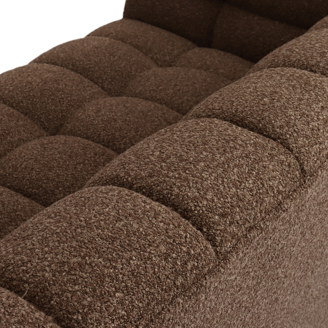 Close-up of the Norah 5-Seater Boucle Sofa Set with Armless Chairs in Brown, showcasing its plush, quilted, chocolate-brown boucle upholstery and tufted cushion design, highlighting luxurious comfort and modern elegance.
