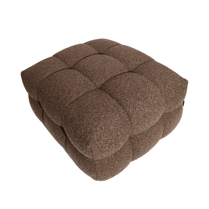 The Norah 5 Seater Boucle Sofa Set With Ottoman in Brown features a square, deeply tufted ottoman with a quilted grid, upholstered in plush boucle fabric, exuding modern elegance and comfort.