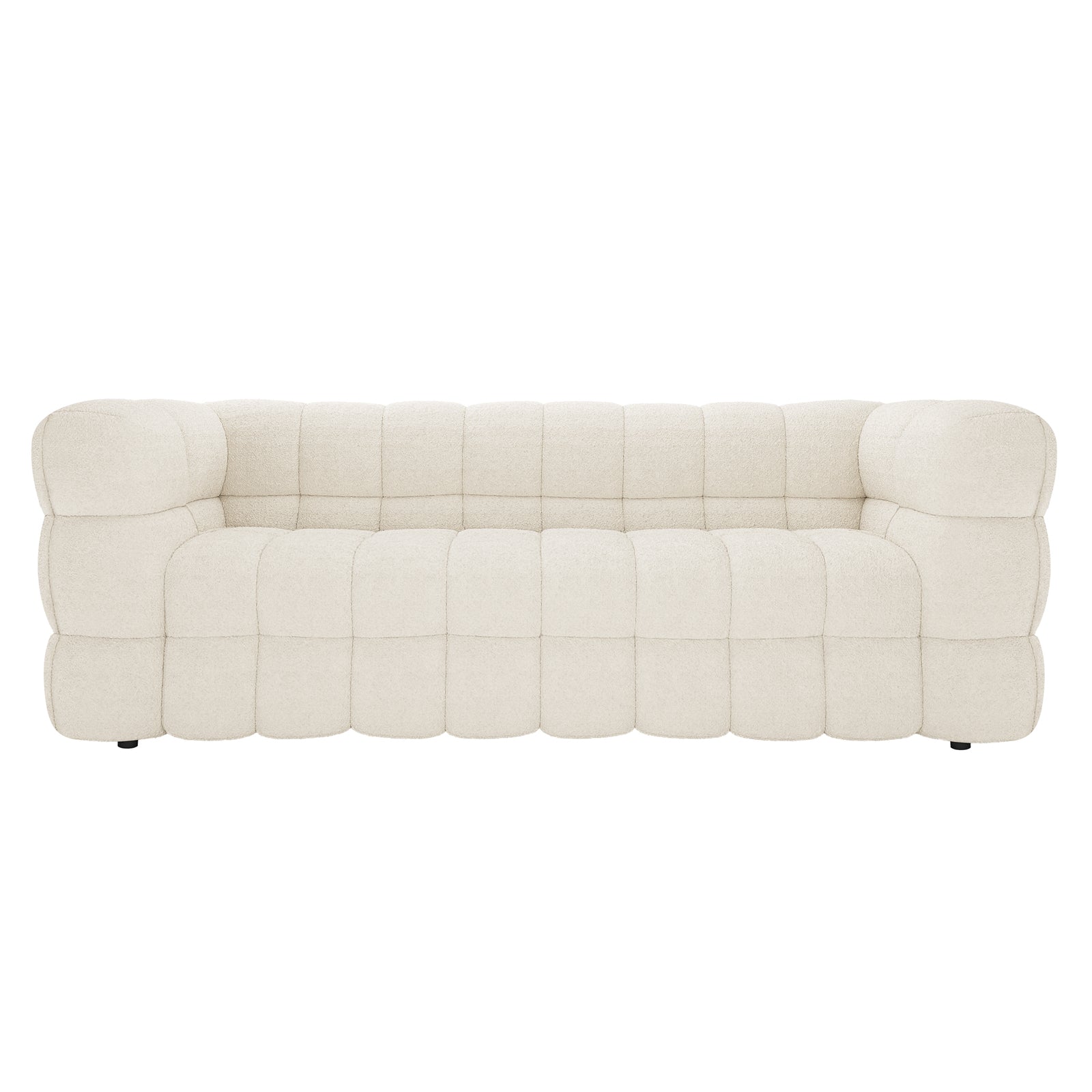 Norah 5 Seater Boucle Sofa Set with Ottoman in Cream White, featuring a tufted, cream-colored, boucle-style upholstery with deep cushion segments, sits on low feet for a modern, stylish look.