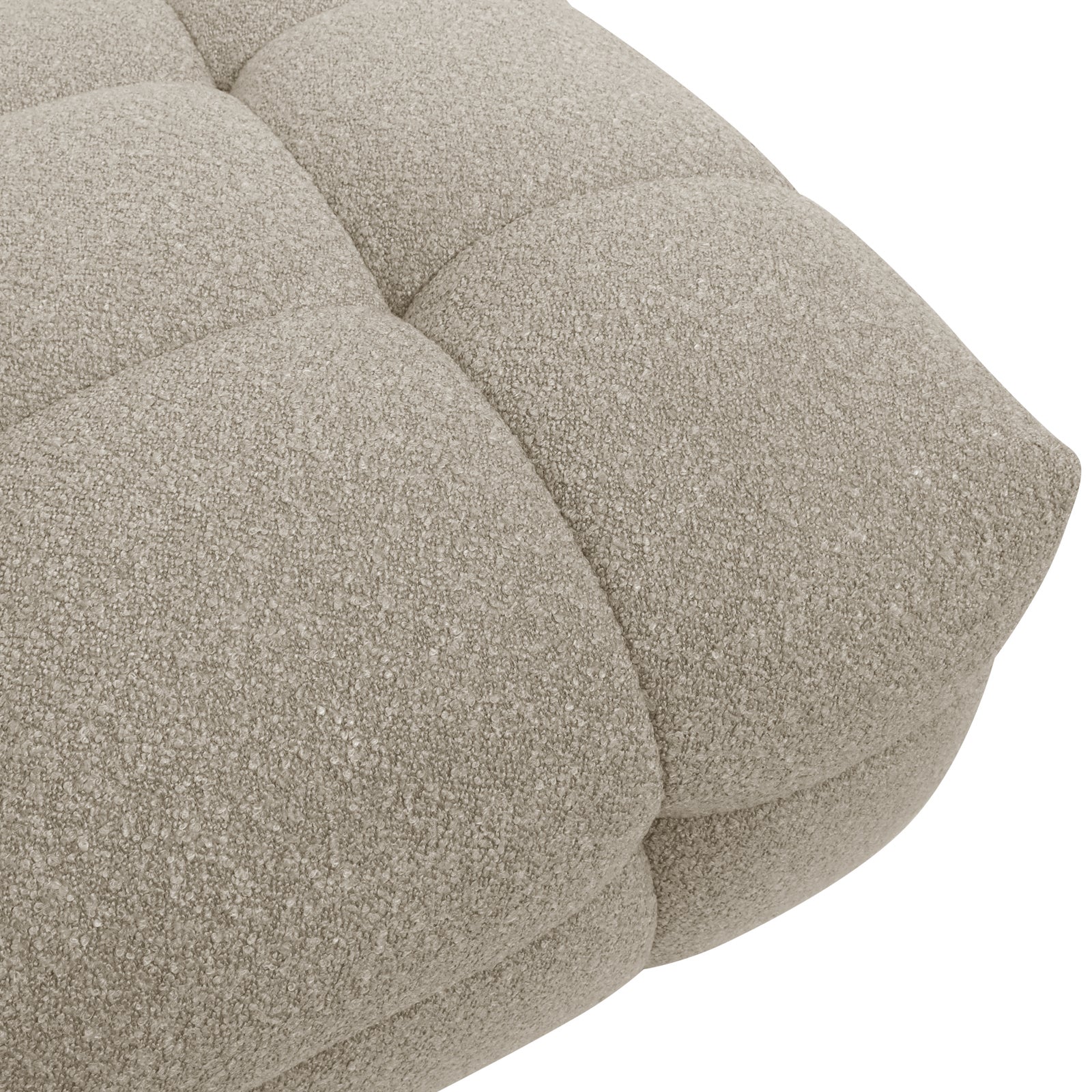 Close-up of the Norah Boucle Single Seater Sofa in Warm Beige, highlighting its tufted, boucle-style upholstery with square stitching and nubby texture, reflecting its luxurious comfort and contemporary design.