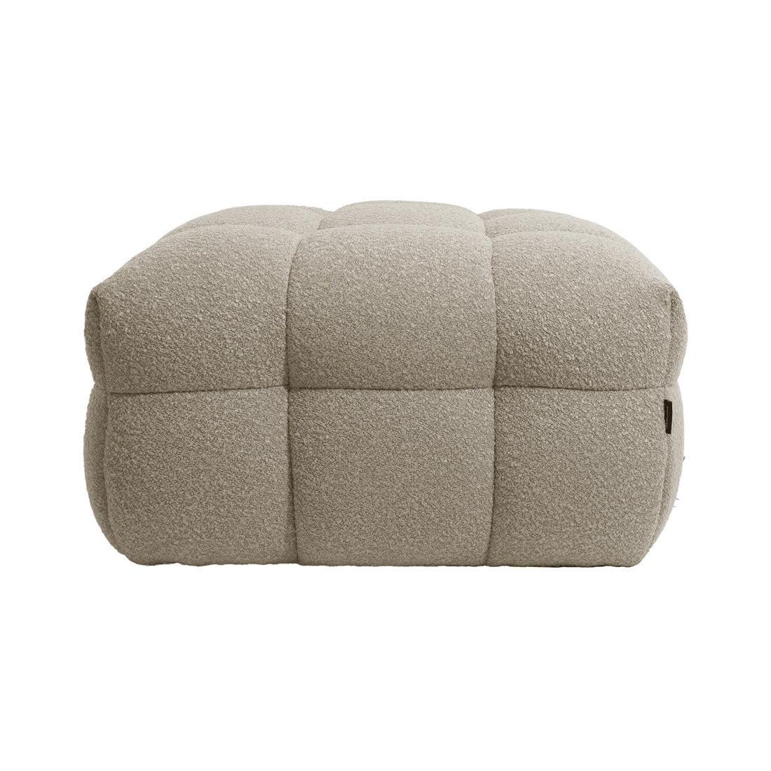 Norah 5 Seater Boucle Sofa Set With Ottoman in Warm Beige, featuring a low, rectangular ottoman with tufted, quilted panels in textured boucle fabric, offering a soft and inviting appearance.